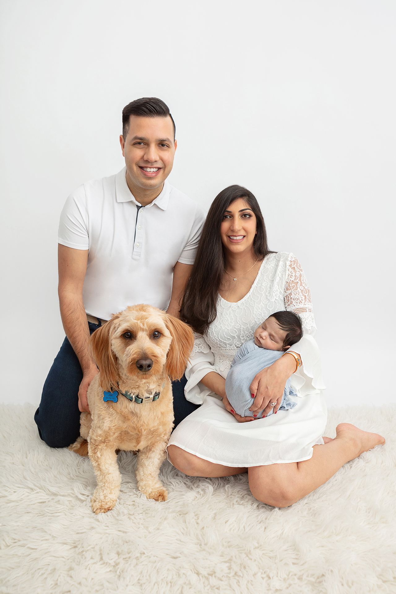 family newborn photography with miniature golden doodle, family medicine doctor dad, dentist mom, newborn baby boy