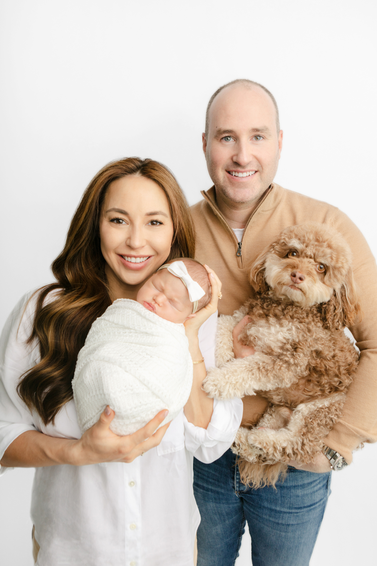 newborn family photo with the family dog included; photographed by Karen Kahn